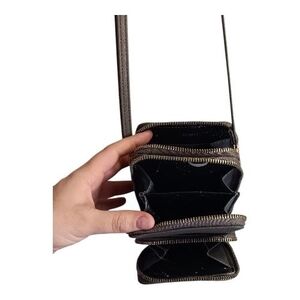 Compact Black Leather Crossbody Wallet with Gold Zippers